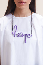 Purple leather women's short with distinctive hope-link metal necklace